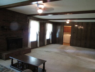 This view is from the hall looking toward the Laun