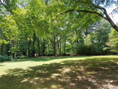 .72 Acre Lot, level with lots of old hardwoods.