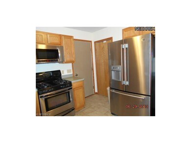 Here is a view of the appliances and the pantry an