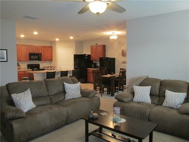 Family Room view to Kitchen and Dining Room Shows 