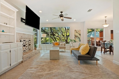 Living area featuring light tile patterned floori
