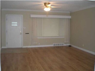 Living room with fresh paint, new flooring and cro