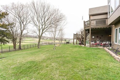 Almost half acre lot with metal fence backing to g