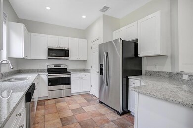 9649 Simeon Dr, Land O Lakes, FL 34638 - photo 7