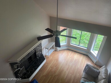 livingroom and fireplace view from stair