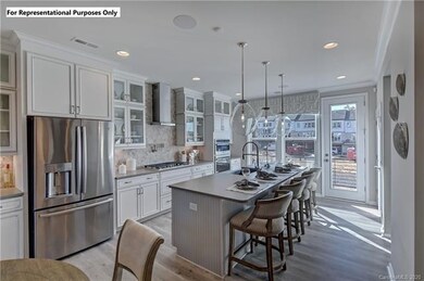 The gourmet kitchen offers 5 range gas burner, a d