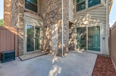Entrance to property featuring a patio