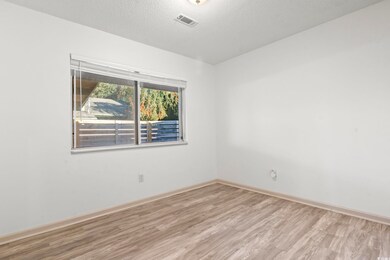 Empty room featuring light wood-type flooring and 
