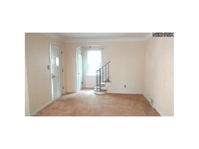 LIVING ROOM FRONT ENTRY AND STAIR CASE