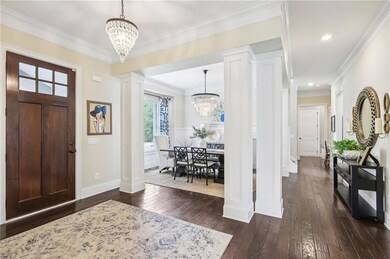 Entrance foyer with decorative columns, ornamental