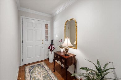 Foyer featuring hardwood / wood-style flooring and