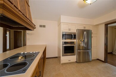 Electric cook top with large hood. Built in oven w