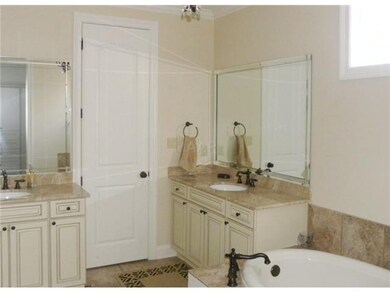 BEAUTIFUL MASTER BATH FEATURES WONDERFUL TILE FLOO