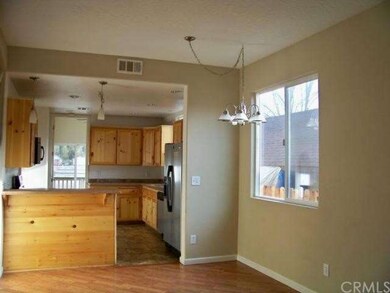  Open kitchen to living room with high ceilings, l