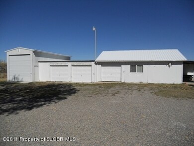 detached 4 car shop/garage