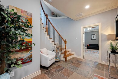 The Downstairs entry features custom paint, recess