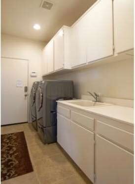 Laundry Room Leading to Garage Access.  Multiple C