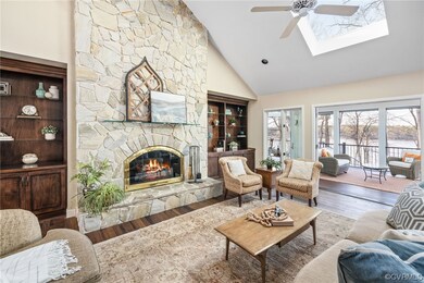 Warm stone surrounds gas fireplace