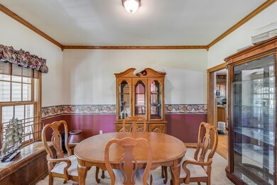 Formal Dining Room with French doors on one side a