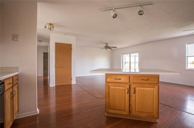 Entry way, basement and hallway to bedrooms!  isla