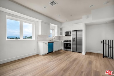 4703 Saturn St unit 1/2, Los Angeles, CA 90019 - photo 2