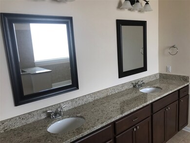 Full bathroom featuring double vanity