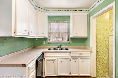 Cozy, easy-care kitchen is the central hub of this charmer!