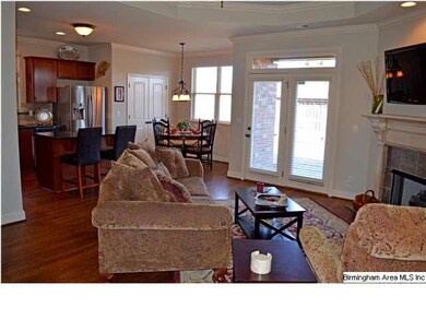 Great Room has hardwood floors, double tray ceilin