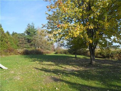 Exterior Back. Approx. 1 acre for front and back y