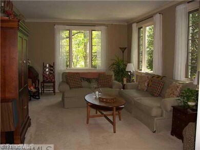 Den/Family/Great Room. Cozy den opens to the sunroom.