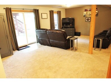 The large family room has a walk-out patio area.