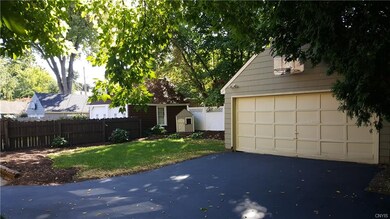 Double wide driveway JUST SEALED with over-sized g
