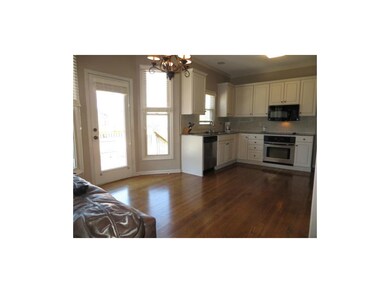 Eat-in kitchen with hardwoods