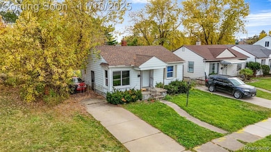 Bungalow with a front lawn, roof with shingles, and a chimney