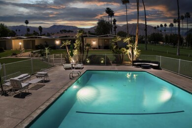 Pool And Condo At Night