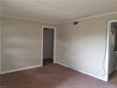 Living room leads to kitchen and first floor maste