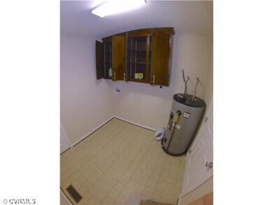 Laundry - Just off the kitchen and ample storage!