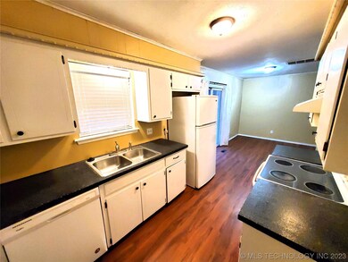 Kitchen and Dining. Refrigerator stays!