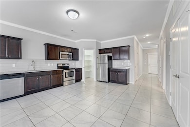 Interior photos shown are representative of the unit's style, features and layout.