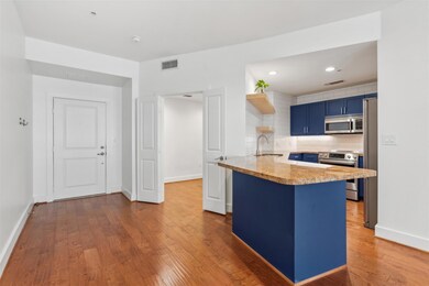 Kitchen with a kitchen breakfast bar, light wood-t