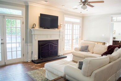 Large living room with a beautiful wood burning fi