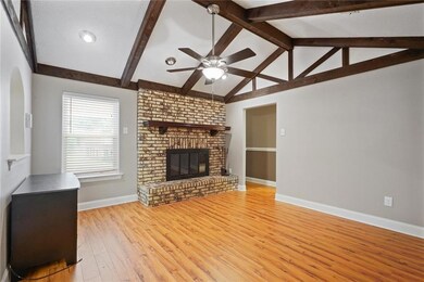 Cathedral ceiling in the Living area with a wood b