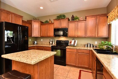 Beautiful Staggered Maple Cabinetry
