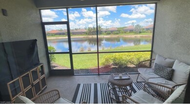 Sunroom / solarium with a water view
