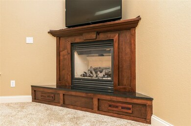 GAS FIREPLACE WITH CUSTOM CHERRY SURROUND
