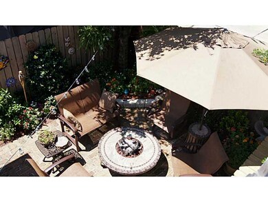 Photo. PATIO VIEW FROM SECOND FLOOR DECK