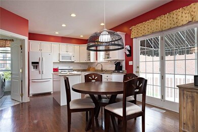 Laundry room is located off of the eat-in kitchen 
