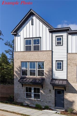 Rare find End Unit! Charming entrance with partial