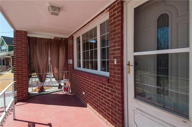 Gracious front porch for taking in the charm of th
