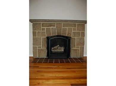 Living Room. *CUT STONE FIREPLACE*